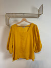 Gele blouse